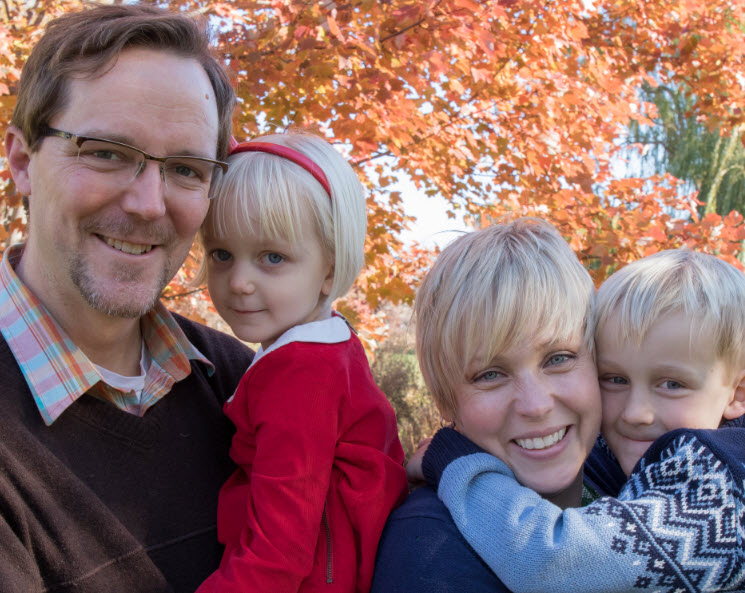 family photo parents and kids fall leaves